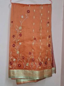 Elegant Orange Floral Saree🧡