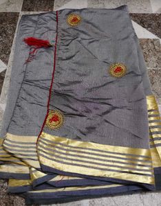 Elegant Grey Saree with Gold Border