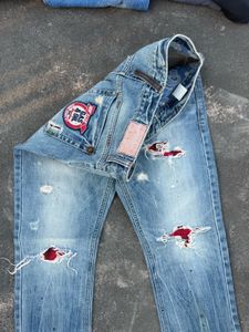 Distressed Patch Jeans