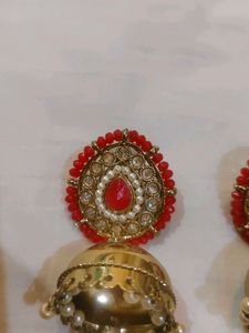 Elegant Jhumka Earrings with Red Stones