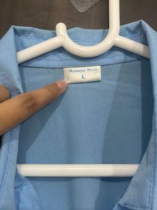 Light Blue Collared Button-Up Shirt