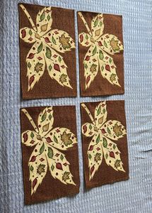 Set of 4 jacquard leaf-patterned placemats