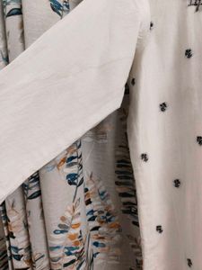 White Embroidered Kurta with Black Trouser