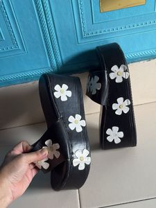 Black Platform Sandals with Flower Embellishments