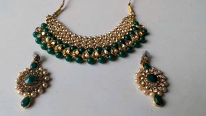 Elegant Emerald Green Kundan Necklace Set