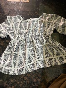Light Green Peplum Top with Geometric Print
