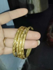 Set of Golden Bangles and 1 singe bange watc