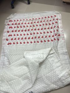 Elegant White Saree with Red Floral Embroidery