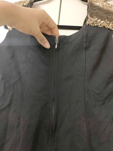 Chic Black Dress with Sequined Shoulders