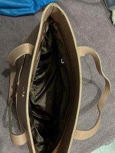 Brand Mochi Pink Solid Handheld Bag,has a Zip Closure 1 Main Compartment Two Handler