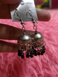 Elegant Silver Jhumka Earrings with Black Beads