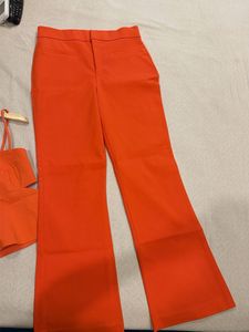 Vibrant Orange Cut-Out Top with pants