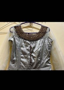 Elegant PistaGreen Anarkali with Embellished Neck