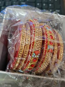 Brand new Set of Red and Gold lakh Bangles