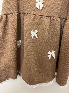 Cute Brown Textured Dress with Bows