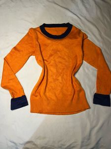 Orange Knit Sweater with Navy Accents