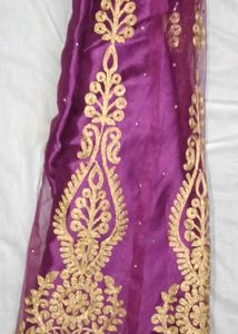 Elegant Purple Saree with Gold Embroidery