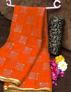 Elegant Orange Saree with White Motifs