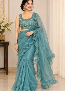 Elegant ruffle saree with Embellished Blouse