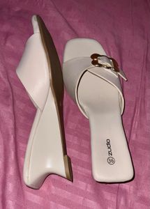 Stylish White Wedge Sandals with Gold Buckle
