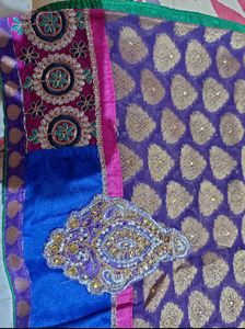 Royal Elegance Net Embroidered Saree with Blouse