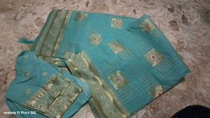 Beautiful Teal Saree with Gold Border