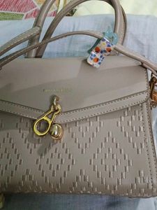 Chic Taupe Textured Handbag with Scarf Accent