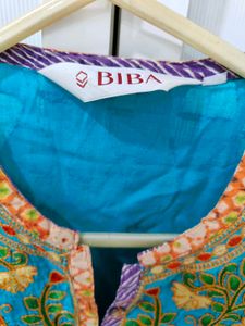 Embroidered Teal Kurta (small rip backside lower)