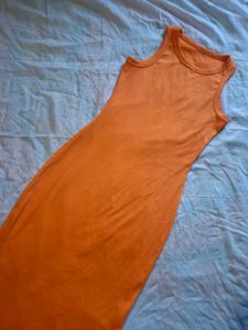 Sleek Orange Sleeveless bodycon Dress. knee length