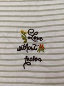 stripped off white top with thread embroidery