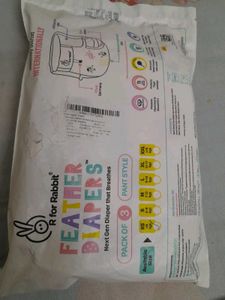 pack of Sanitary Napkins and baby diapers