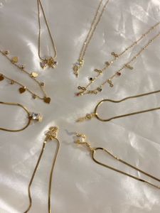 Elegant Gold Tone Charm Necklaces