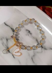 Colorful Beaded Bracelet with Flower Charm