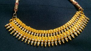Party wear golden chokar necklace