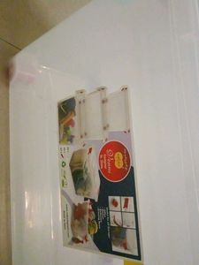 Clear Storage Bin with Assorted Contents