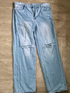 Light Wash Ripped Jeans (never worn)