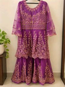 Stunning Purple Embroidered Lehenga Choli with pan