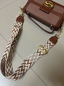 Chic Brown Crossbody Bag with Patterned Strap
