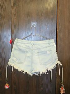Distressed Lace-Up Denim Shorts