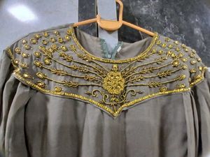 Elegant Embellished Cape Gown