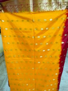Vibrant yellow Saree with Gold Motifs