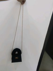 Chic Mini Black Handbag with Fur Accent