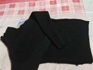 Black Ribbed Turtleneck Sweater