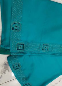 Elegant Teal saare nd blouse with Embellishments