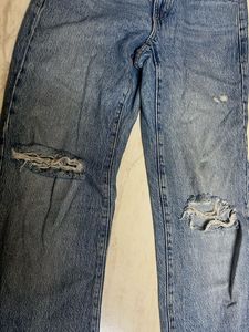 Distressed Blue Denim Jeans