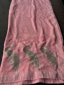 Elegant Pink Saree with Peacock Design