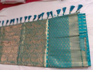 Elegant Teal and Gold Brocade Saree