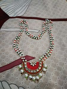 Elegant Beaded Necklace with Red Pendant