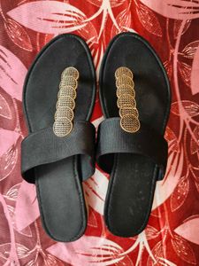 Stylish Black Thong Sandals with Gold Accents