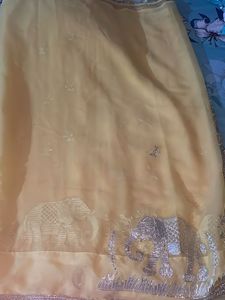 Elegant Yellow Saree with Elephant Motif
